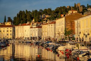 Historic Piran harbour and waterfront along the Slovenian coast mountain bike route