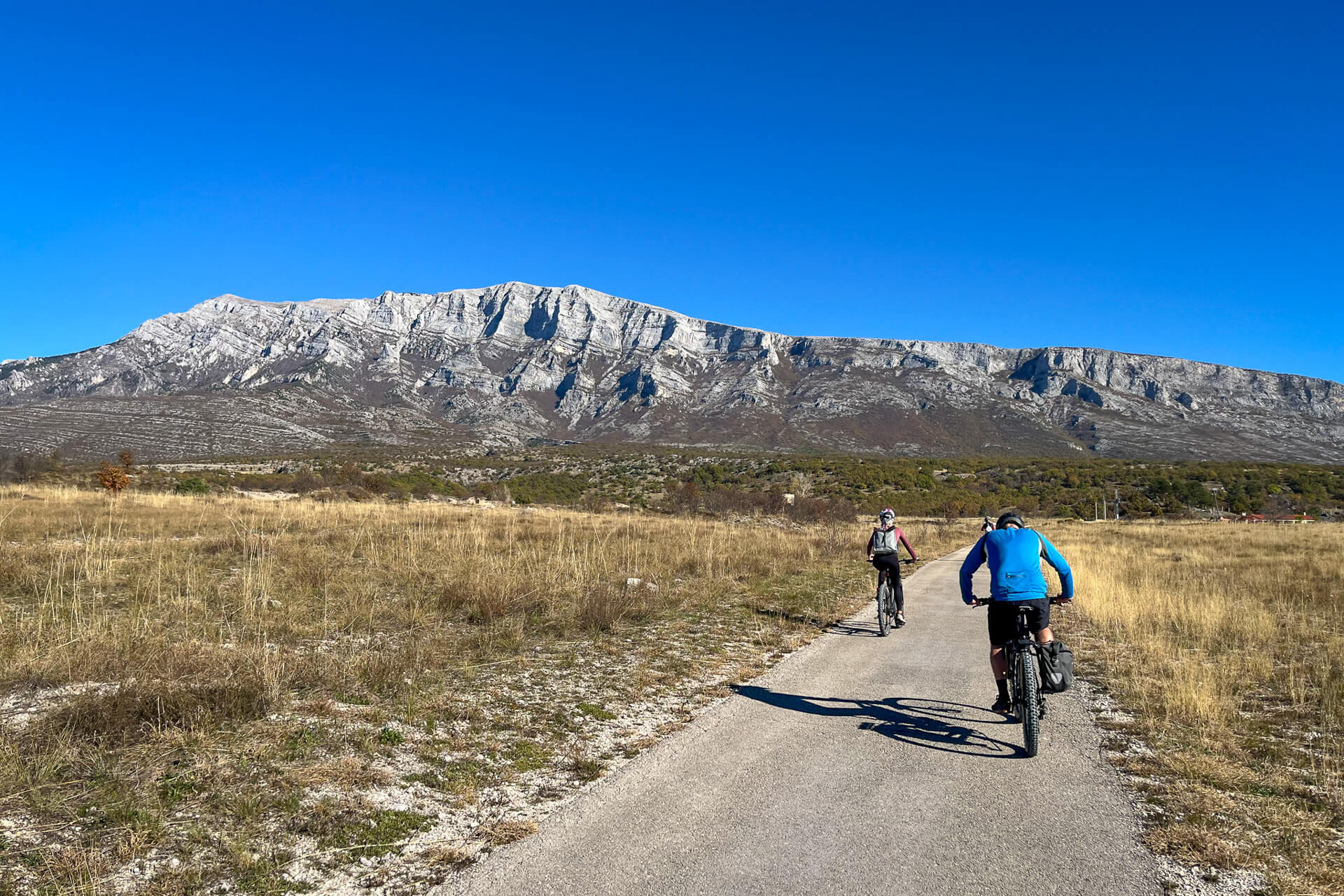Cycling under Mount Dinara, which lent its name to the cycling route.