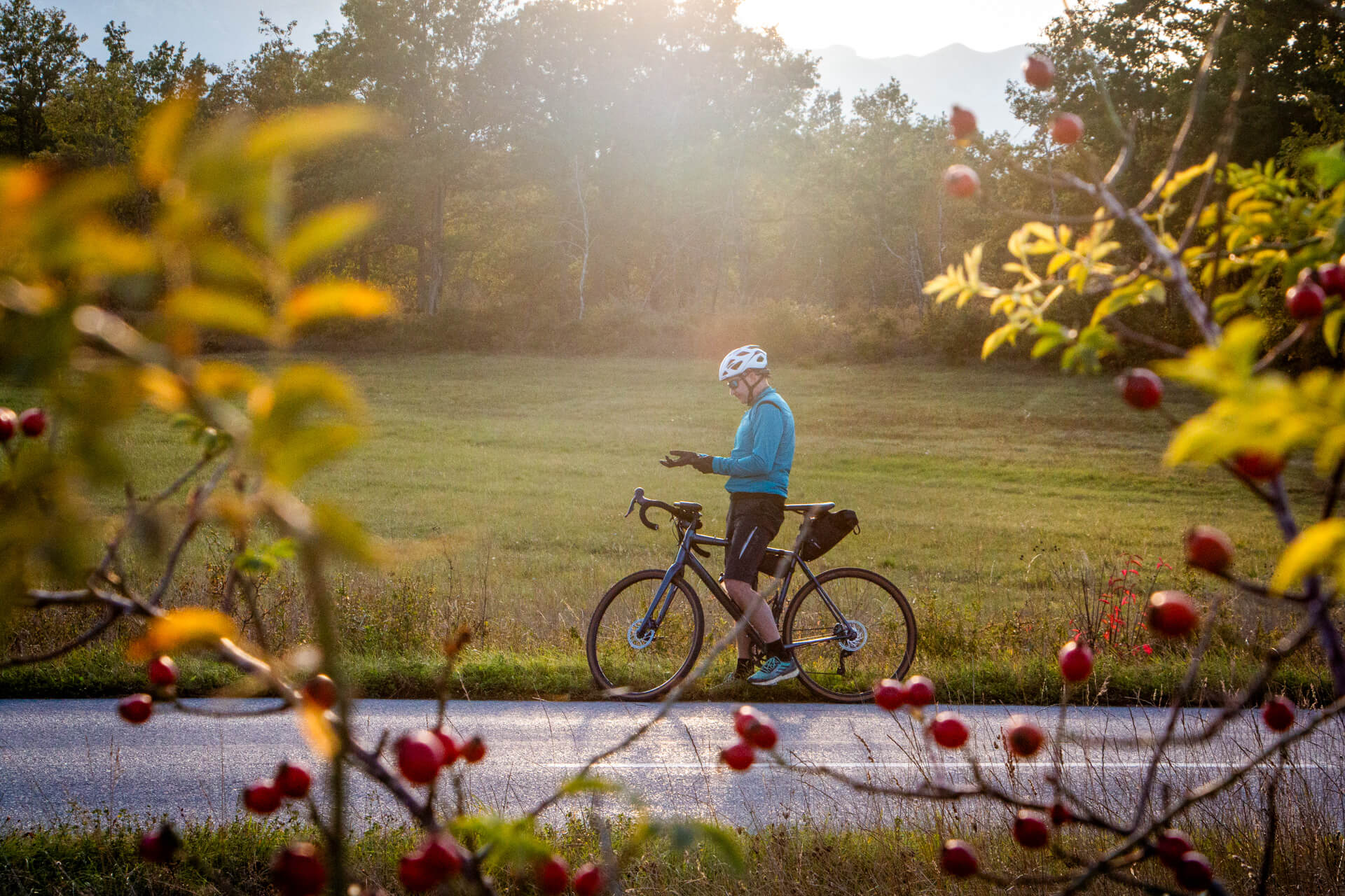 A gravel bike cyclist enjoys the natural beauty of the Lika region in Croatia.