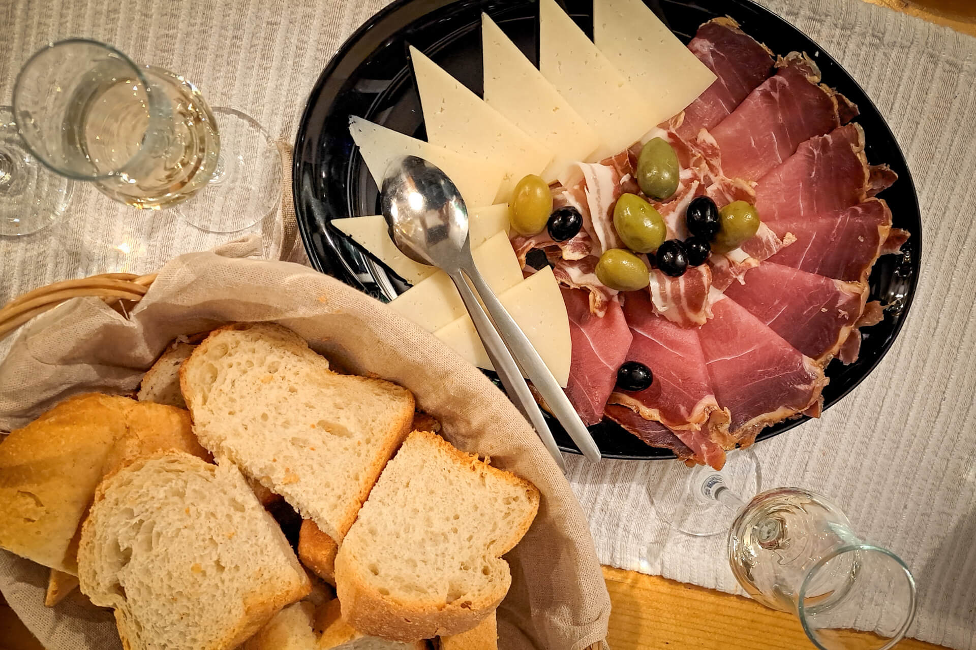 A typical Croatian dinner: cold cuts with homemade prosciutto and cheese.