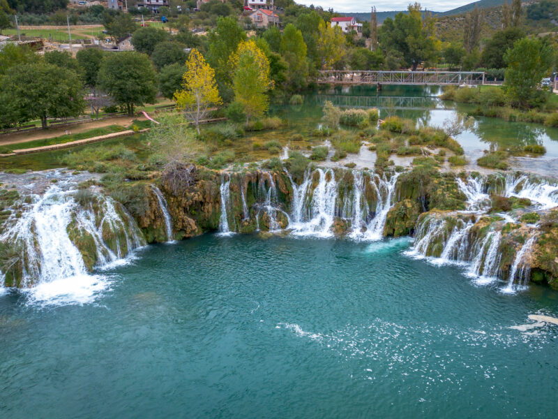 The waterfalls of the Zrmanja River, one of the natural beauties on a gravel bike tour in Croatia.
