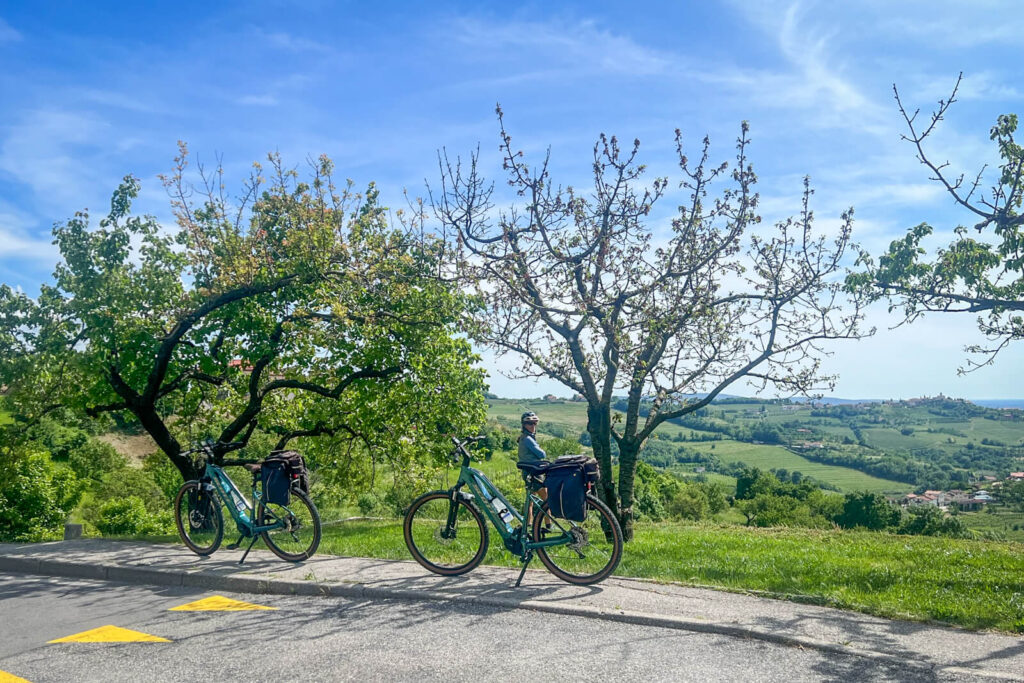 Two ladies on e-bikes riding in Slovenia.